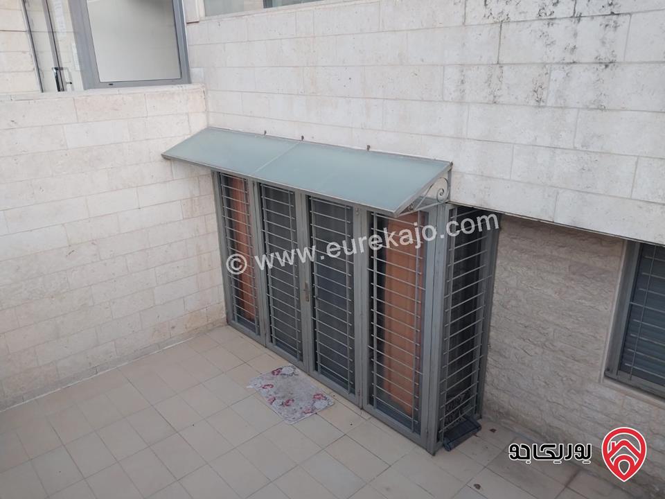 شقه للايجار في عمان - الدوار السابع مساحة 80م + 130م شبه ارضي قرب الترخيص