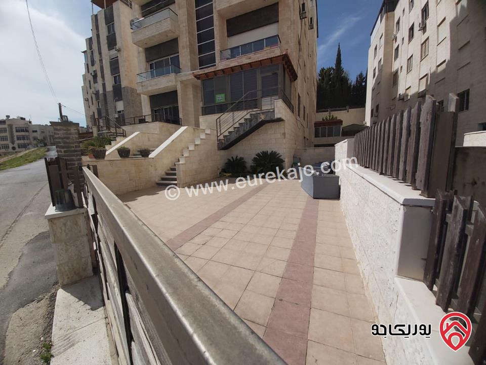 شقة طابق ارضي مساحة 100م للبيع في عمان - الرابية
