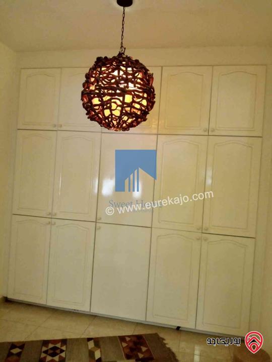 شقة أرضية مساحة 130م مع حديقة وترسات 250م للبيع في عمان - خلدا