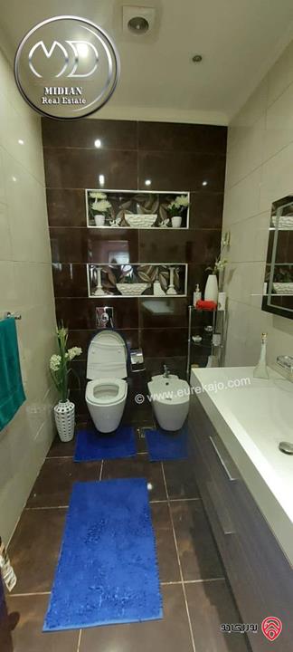 شقة ارضية مفروشة للايجار في عمان - الجاردنز مساحة 180م مع ترس و حديقة 200م تشطيبات و فرش سوبر ديلوكس