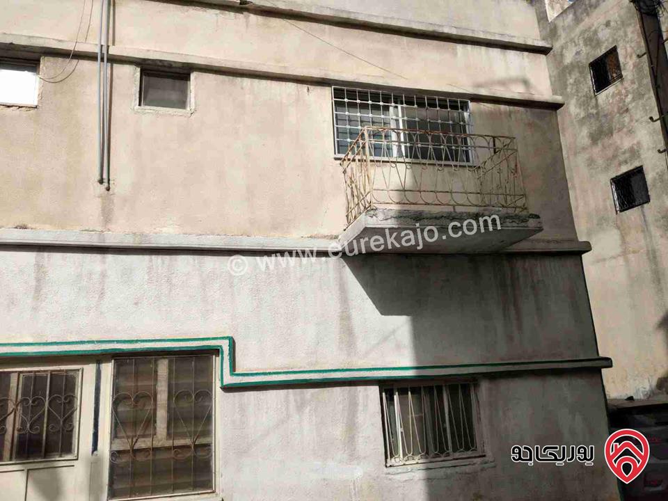 منزل مستقل طابقين على أرض 303م تصنيف تجاري للبيع في اربد - مجمع الغور القديم