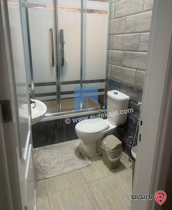 شقة مميزة شبه أرضية مساحة 130م للبيع في عمان - خلدا