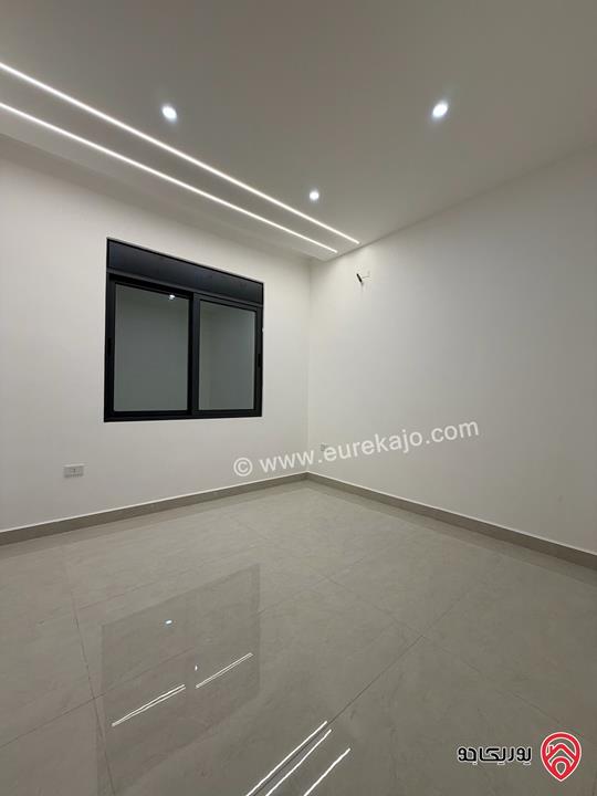 شقة طابق أول مساحة 90 متر داخلي وترس 60 متر للبيع في عمان - ضاحية الياسمين