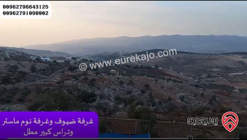 مزرعة مساحة الأرض 3500م والبناء طابقين دوبلكس 200م ومسبح للبيع في جرش - المصطبة