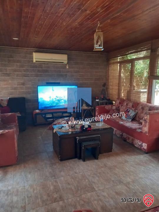 شقة أرضية مساحة 130م مع حديقة وترسات 140م للبيع في عمان - خلدا