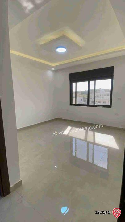 شقة جديدة طابق اول مساحة 140متر للإيجار في عمان - مرج الحمام 