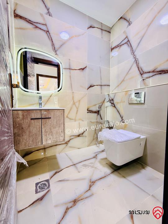 شقة طابق اخير مع روف مساحة 230م للبيع في عمان - شفا بدران اقساط 