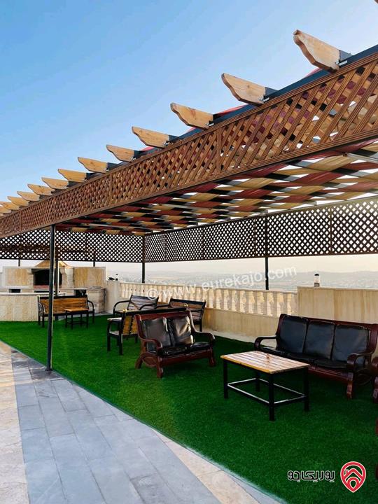 شاليه استثماري مميز مساحة الأرض 4 دونم و 500م والبناء 250م للبيع في المفرق - بلعما 