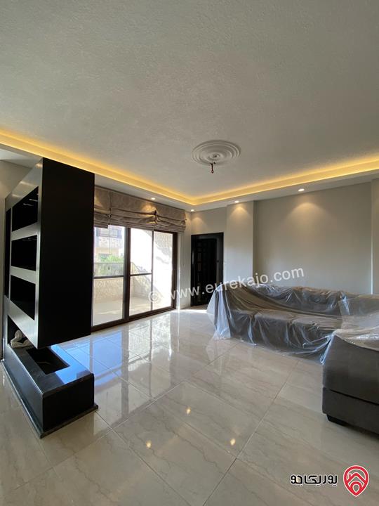 شقة مميزة جداً طابق ثاني مساحة 195م للبيع في عمان - منطقة ام أذينة 