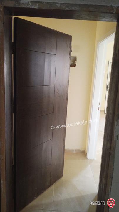 شقة طابق أول مساحة 128م للبيع في عمان - الجبل الأخضر حي نزال الشمالي 