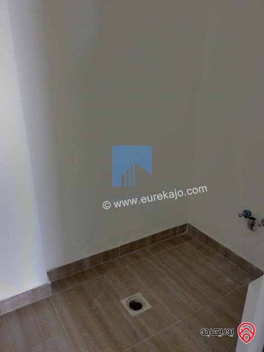 شقة أرضية فاخرة 130م مع ترس 50م تشطيب سوبر ديلوكس لم تسكن للبيع في عمان - الجندويل