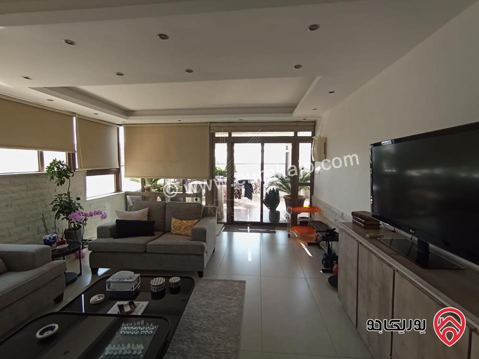 شقة فاخرة طابق أخير مع روف مساحة 211م للبيع في عمان - خلدا مع اطلالة مميزة