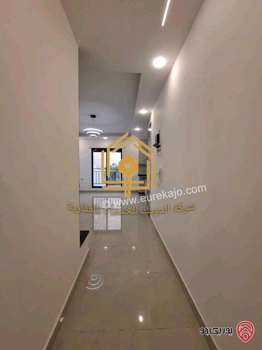 شقة جديدة لم تسكن طابق ثاني مساحة 150م للإيجار في عمان - الجندويل 