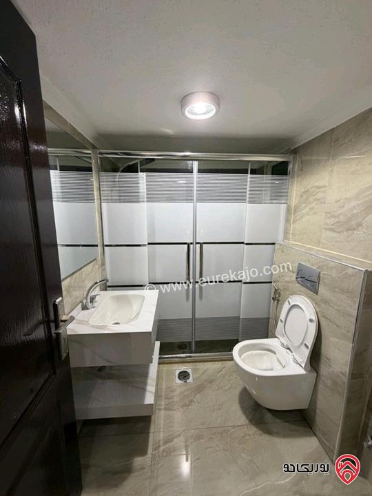 شقة طابق أرضي معلق مساحة 130م للبيع في عمان - ضاحية الرشيد