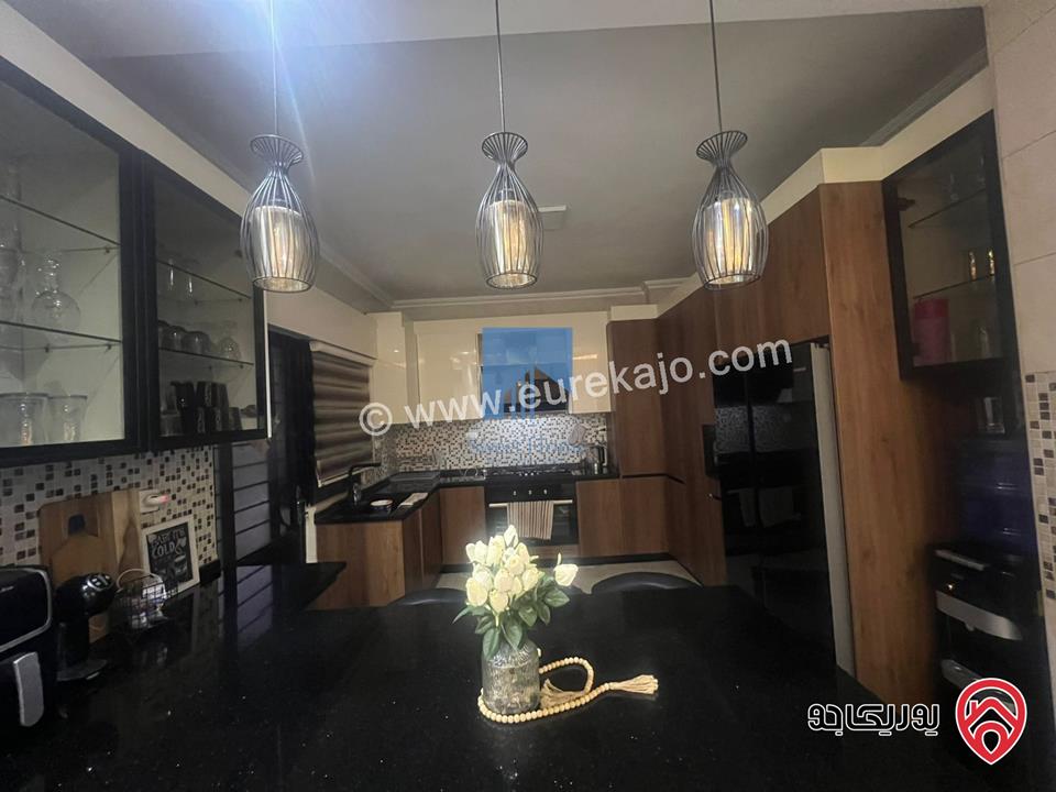 شقة أرضية مميزة للبيع في عمان - الجندويل قرب مركز أمن البيادر 180م مع حديقة وترسات 200م