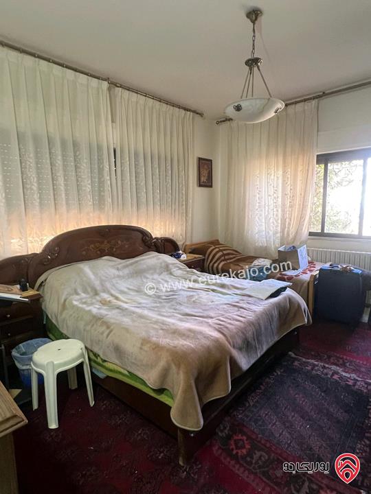 A standalone two-story house with a built-up area of 150 sqm and Size of land 400 sqm for sale in Amman - Dahiyet Alrasheed