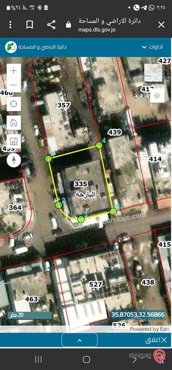 قطعة أرض مساحة 661م مقام عليها مبنى استثماري للبيع في اربد - المدينة الصناعية