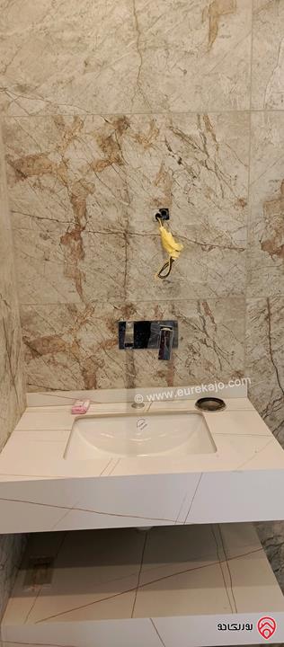 شقة جديدة طابق اول مساحة 150م للبيع في عمان - الجبيهة خلف حديقة الجبيهة