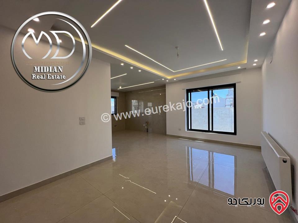 شقة ارضية جديدة للبيع في عمان - ضاحية النخيل مساحة 185م مع ترس 50م تشطيبات ديكورات فاخرة بسعر مميز