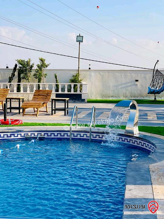 شاليه استثماري مميز مساحة الأرض 4 دونم و 500م والبناء 250م للبيع في المفرق - بلعما 