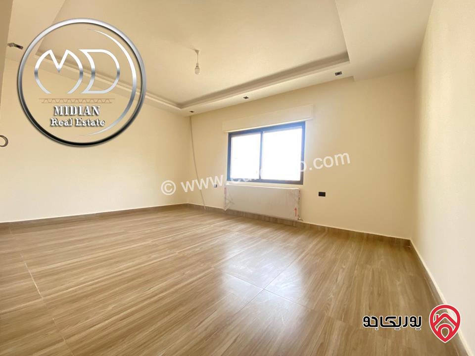 شقة أرضية جديدة للبيع في عمان - الظهير مساحات 200م مع تراسات تشطيبات و ديكورات سوبر ديلوكس بسعر مميز