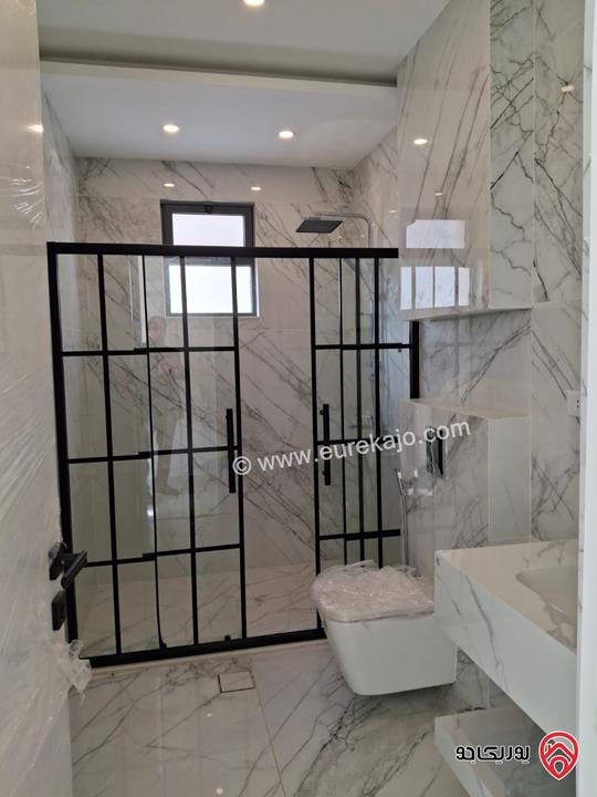 شقة جديدة طابق أول مساحة 175م للبيع في عمان - الرابية