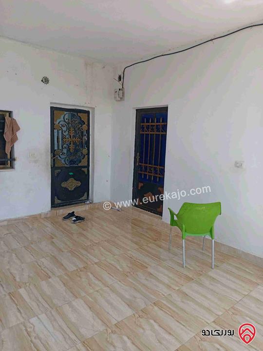 بيت طابقين مساحة 250م على أرض 200م للبيع في الزرقاء - منطقة العالوك قرب شارع الأردن 