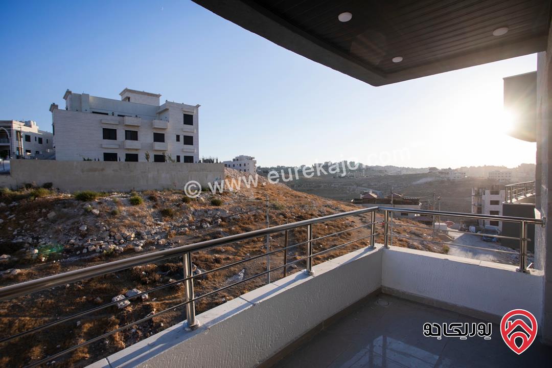 شقة طابق ثالث مع روف مساحة 170م و ترس 100 متر للبيع في عمان - ابو علندا