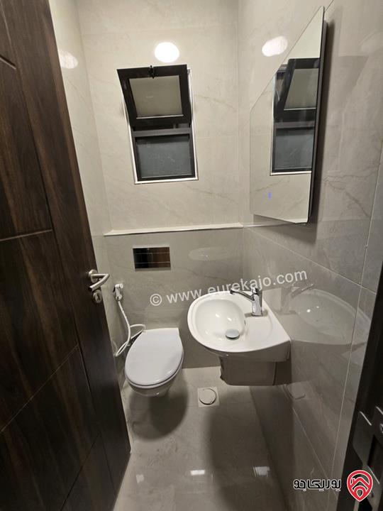 شقة أرضية مساحة 115م مع تراسات 90م للبيع في عمان - تلاع العلي