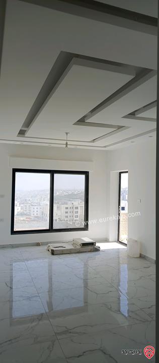 شقة جديدة طابق اول مساحة 150م للبيع في عمان - الجبيهة خلف حديقة الجبيهة