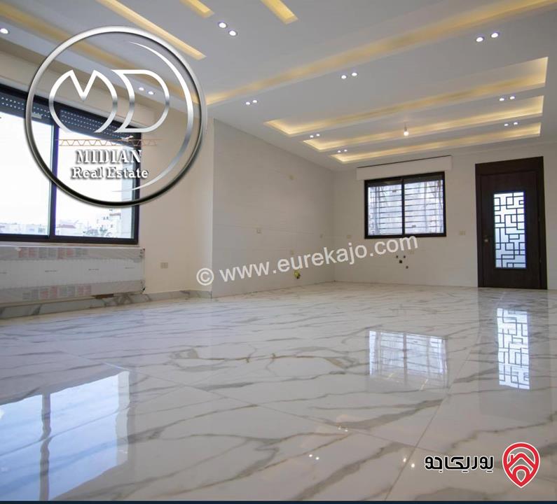 شقة شبه ارضي جديدة للبيع في عمان - تلاع العلي مساحة 185م مع ترس 50م تشطيبات سوبر ديلوكس بسعر مميز جداً