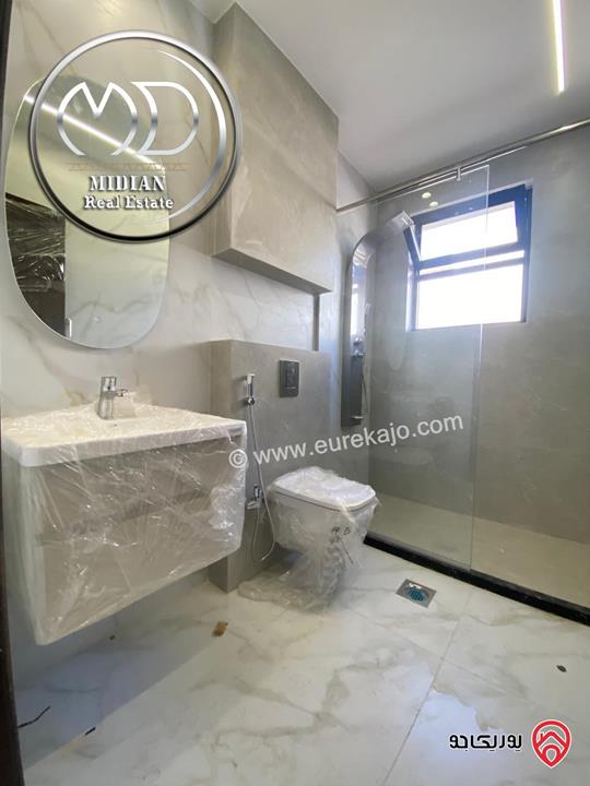 شقة ارضية جديدة فارغة للايجار في عمان - ضاحية الرشيد مساحة 180م مع ترس 30م تشطيبات ديكورات سوبر ديلوكس