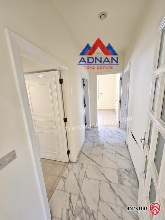 شقة ارضية مساحة 170م داخلي و 90م خارجي للإيجار الفارغ مع مدخل خاص من ضمن فيلا في عمان - الرابية