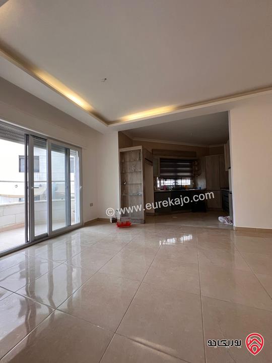 شقة شبه ارضية مساحة 110م للايجار في عمان - خلدا