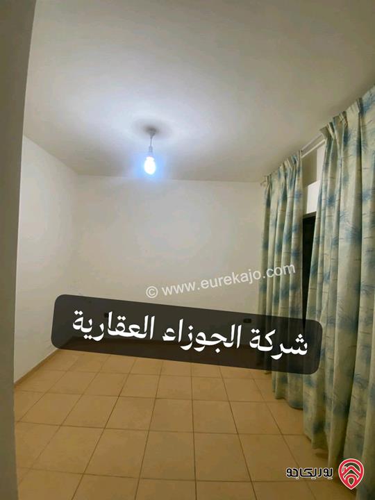 شقة فارغة طابق أول مساحة 110م للايجار في عمان - مرج الحمام إسكان الضباط