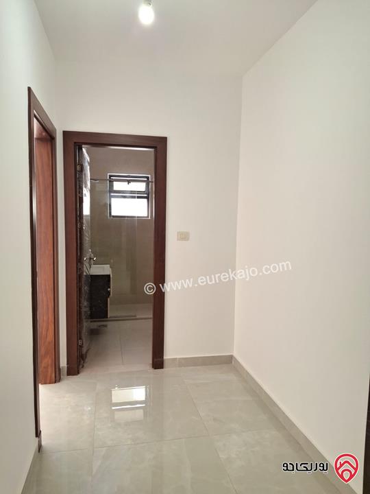 شقة جديدة طابق أول مساحة 180م للبيع في عمان - دير غبار