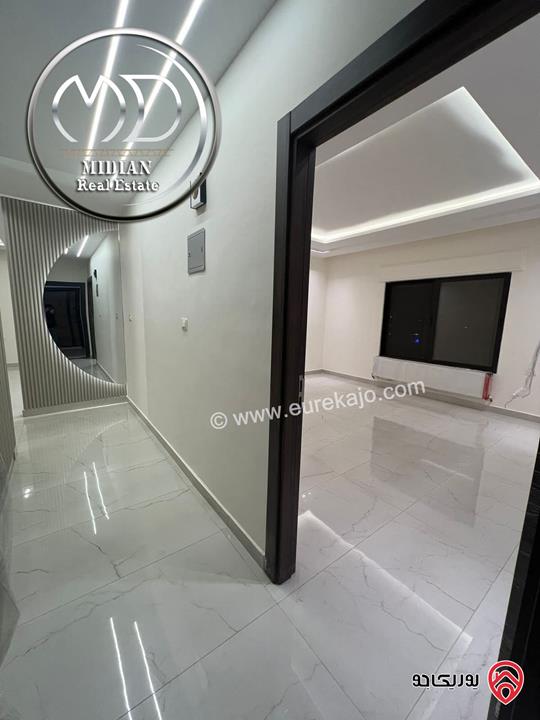 شقة شبه ارضي جديدة للبيع في عمان - ضاحية الرشيد مساحة 225م مع ترس 100م تشطيبات سوبر ديلوكس بسعر مميز 