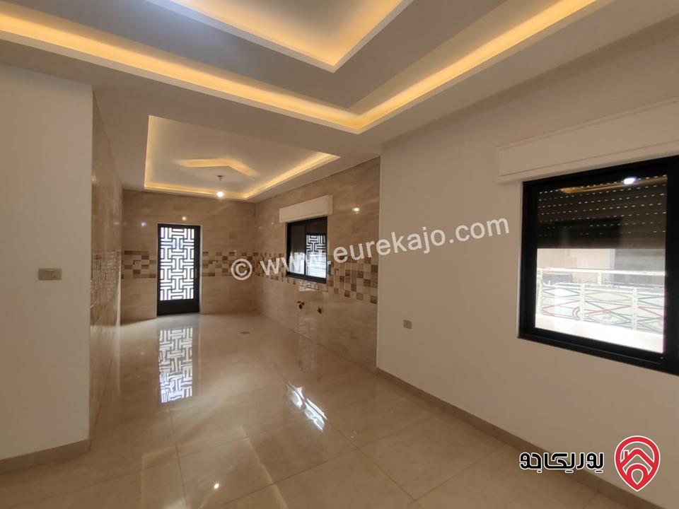 شقة ارضية مساحة 135م للبيع في عمان - جبل الزهور          	 