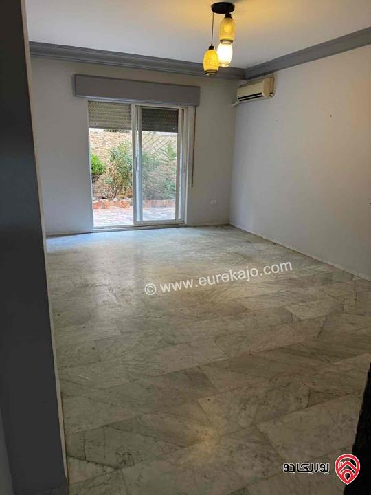 شقة طابق شبه أرضي مساحة 150م داخلي و 150م خارجي للايجار في عمان - الرابية 