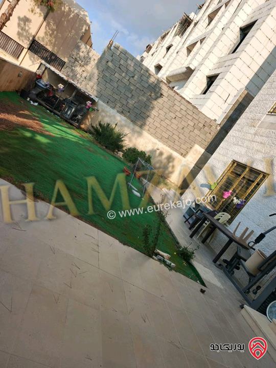 شقة مميزة شبه ارضية مساحة 200م داخلي و 120م خارجي للايجار في عمان - حي الصحابة 