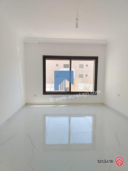 شقة فاخرة للبيع في عمان - خلدا قرب المدارس الإنجليزية طابق ثالث 280م مع روف دوبلكس 180م لم تسكن