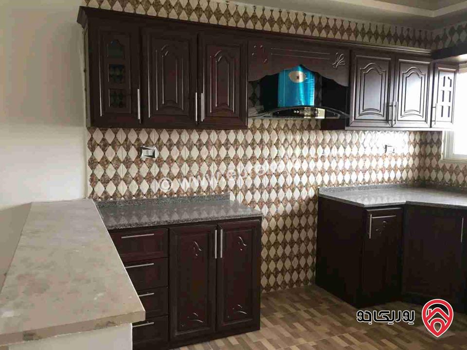  شقة مساحة 130م طابق أرضي معلق للبيع في الزرقاء - الزرقاء الجديدة شارع ١٦ 