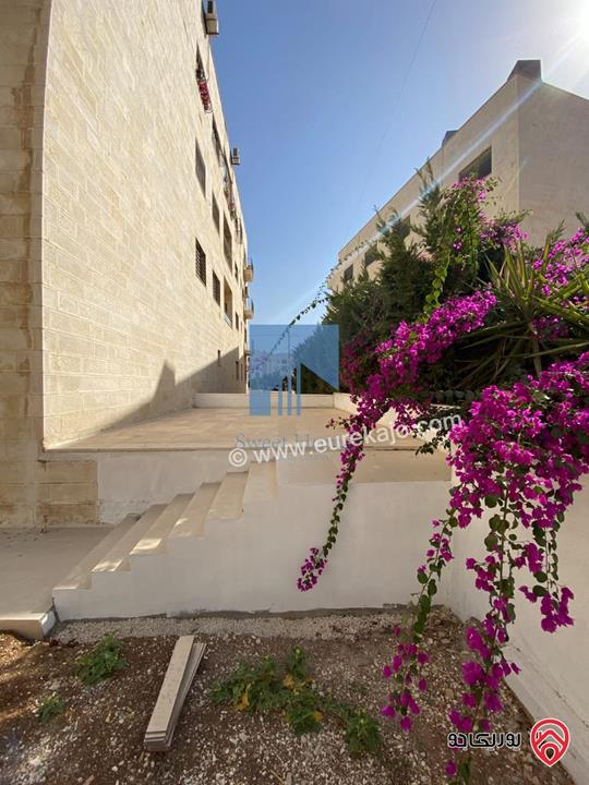 شقة أرضية (شبه فيلا) طابقية فاخرة للبيع في عمان - الرابية قرب الكالوتي 425م مع حديقة وترسات 500م