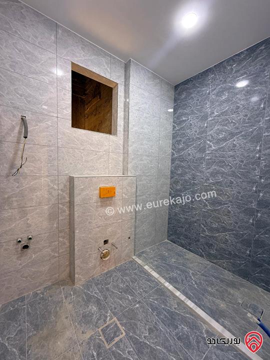 شقة أرضية ديلكوس مساحة 150م داخلي و 90م خارجي للبيع في عمان - الجبيهة الامام الغزالي