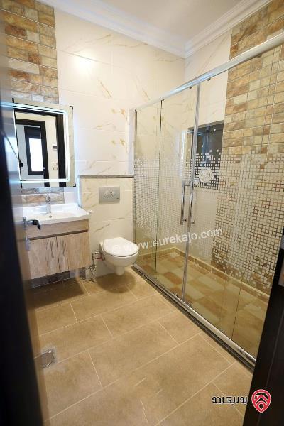 شقة طابق أرضي مساحة 175م مع ترس للبيع في عمان - طريق المطار قرب جامعة البترا 