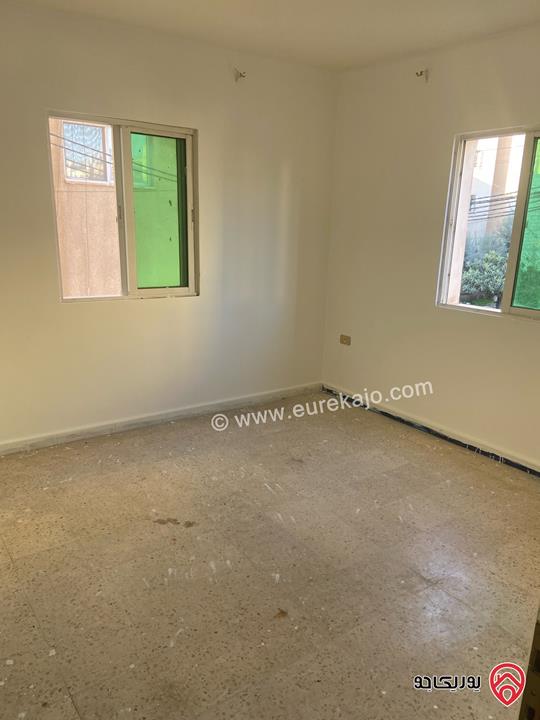 شقة طابق أول مساحة 126م للايجار في اربد شارع القدس