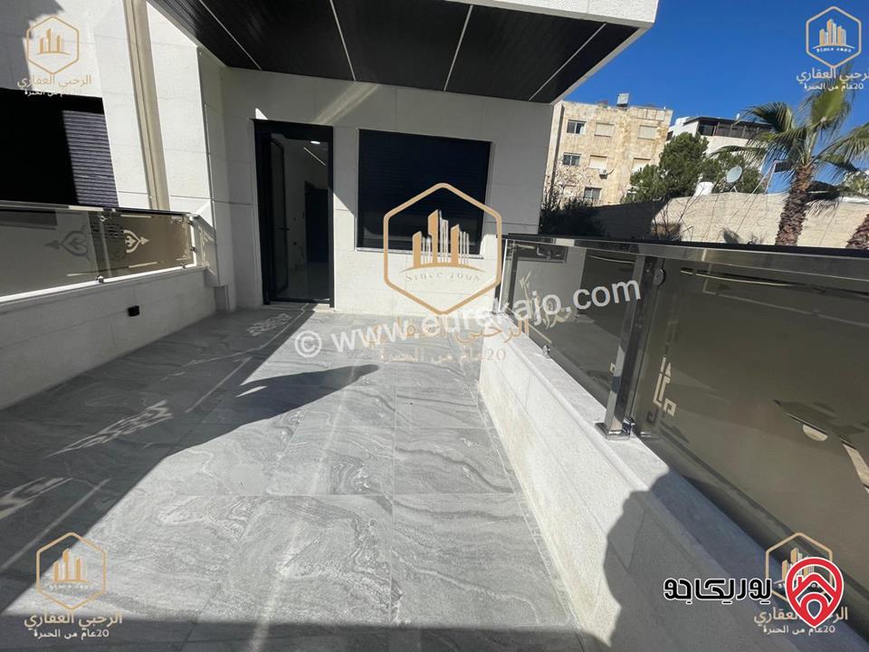 شقة ارضية مساحة 145م مع ترس خارجي 135م للايجار في عمان - الجندويل
