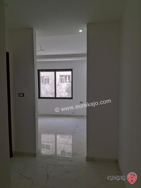 شقة جديدة طابق أول مساحة 170م للبيع في عمان - الرابية