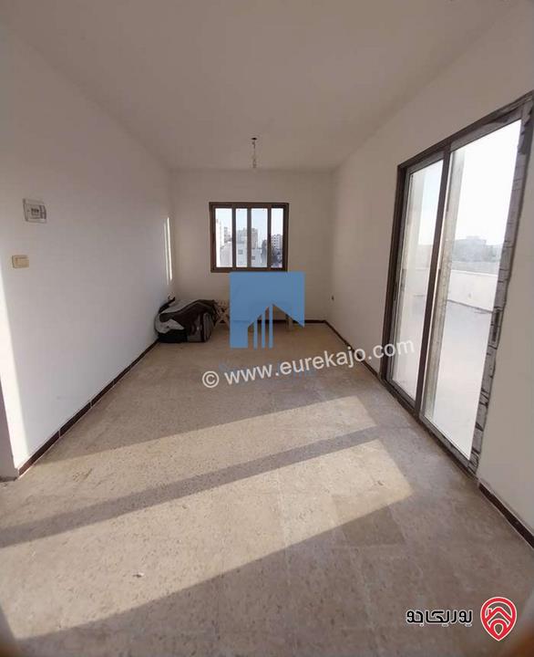 شقة مميزة طابق ثالث 180م مع روف 80م للبيع في عمان - الرابية