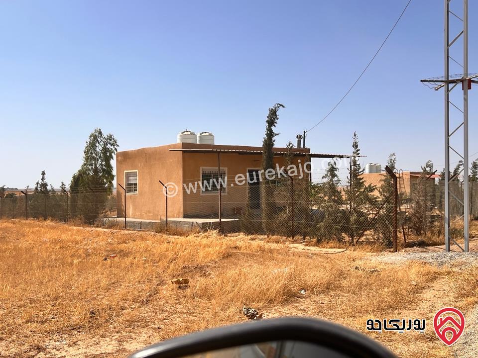 قطعة ارض 20 دونم للبيع في ام الرصاص محافظة العاصمة على الشارع الرئيسي منطقة هادئة 